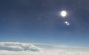 Three UFOs photographed from plane somewhere over the Middle East