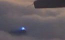 UFO filmed from plane at 30,000 feet over the ocean