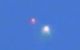 White and red UFOs captured over Mexico City on January 10, 2013