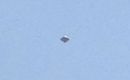 Silvery UFO photographed over Mexico City on February 28, 2013