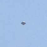 Silvery UFO photographed over Mexico City on February 28, 2013