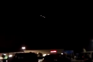 Three UFOs caught on film descending over Cincinnati, Ohio